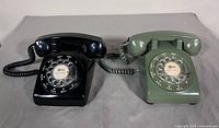 Both telephones side by side showing colors and condition