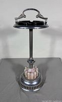 Full view of chrome floor stand ashtray