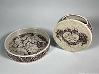 Shallow bowl and bud vase showing overall design