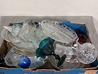 box containing assorted glass pieces