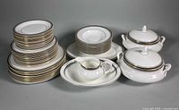 Full set showing plates stacks, bowls, covered vegetable bowls, platter and creamer