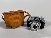 Camera with leather case front view