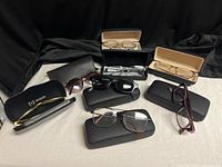 Overview of all eight frames with cases on table