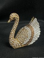 Front angled view rhinestone swan figurine