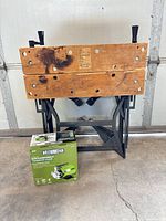 Overall view of workbench folded open with boxed pump in front