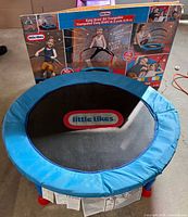 Front view of assembled 3 ft Little Tikes trampoline with box