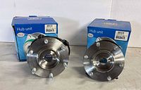 Both SKF wheel hub assemblies front view with boxes