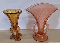 Front view of both vases showing colours, shapes, handles and footed base