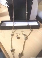 Full view of necklace, earrings and gift box