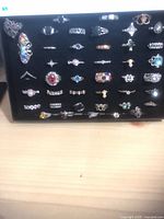 Front view of full ring assortment in display case