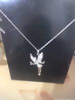 Rhinestone fairy pendant on silver-tone chain