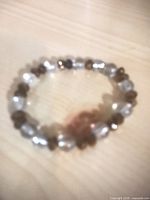 Clear and copper-tone bead stretch bracelet overall view