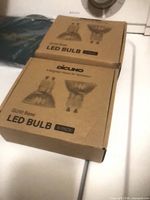Two boxed DiCUNO GU10 LED bulb 6-packs