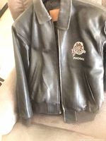 Black leather Planet Hollywood Phoenix bomber jacket front view