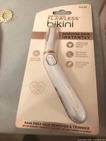 Front of sealed Flawless Bikini hair remover package