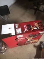 Box showing Home Accents Holiday 2.5 ft LED Little Deer