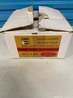 Front of box showing product label with size, quantity and type of screws