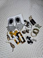 All ten pairs displayed on textured surface