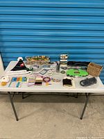 Wide shot of entire lot laid out on table