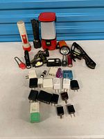Group view of all flashlights, chargers and accessories