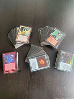 Multiple stacks of Vampire: The Eternal Struggle cards displayed on table