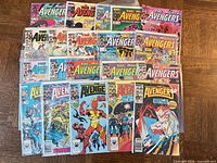 Full lot view showing all twenty bagged Avengers comics