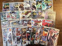Full lot of 36 Batgirl New 52 comics spread out, visible issue numbers
