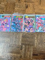 All four Justice League No Justice issues laid out