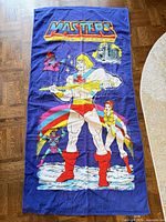 Full view of towel showing complete graphic layout