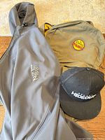 Backpack, hoodie and cap grouped