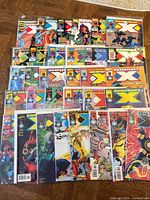 All 32 Mutant X issues laid out bagged and boarded