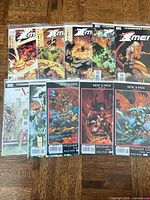 All ten bagged Marvel New X-Men comics spread out showing covers