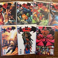 Seven Superman/Batman issues #27-33 bagged and boarded