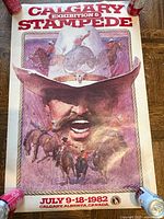 Full view of unframed 1982 Calgary Stampede poster showing artwork, title and date