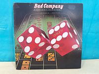 Front cover of Bad Company Straight Shooter vinyl LP showing dice artwork and title