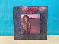 Front album cover showing title and portrait