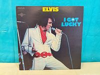 Front cover of Elvis Presley "I Got Lucky" LP showing artwork and title
