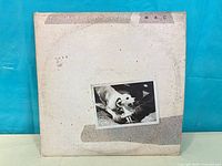 Front cover showing artwork and wear