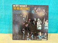 Front jacket with album title and live performance photos