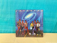 Front cover of The Jacksons "Victory" LP showing artwork and title