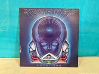 Front cover of Journey Frontiers album