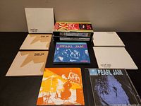 Group shot of all CDs and VHS tapes