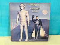 Front cover showing album art and title