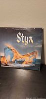 Front cover showing Styx Equinox artwork