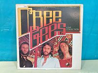 Front jacket artwork showing album title and artists