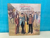 Front jacket showing album title and band members