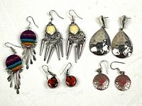 Overview of all five earring pairs on white background