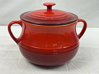 Front view of Le Creuset stoneware bean pot with lid