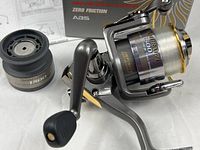 reel with attached spool and spare spool side by side