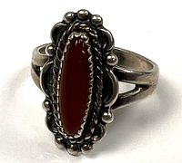 Front view of ring showing carnelian stone and decorative bezel